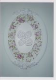 quadro oval  com flores